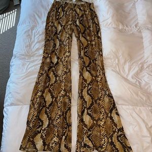 NWOT Snakeskin print flare leggings